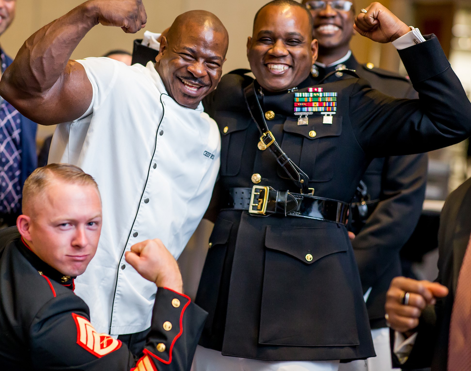 Chef Andre Rush with Marines in dress blues