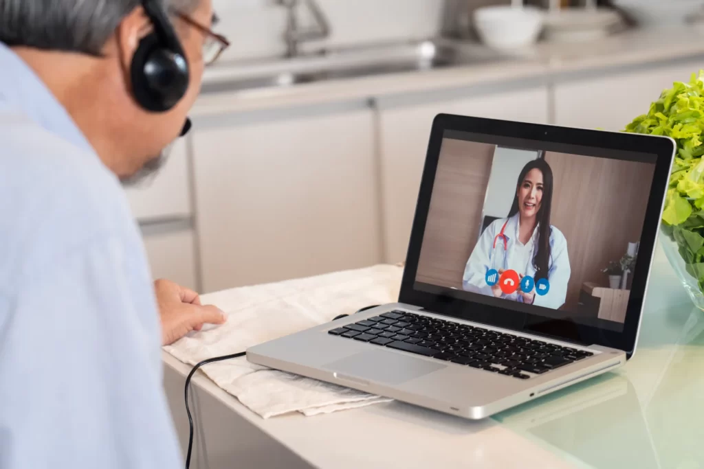 man having video call with female doctor utc